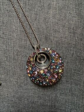 Brighton “Trust Your Journey” reversible circle pendant; multicolored crystals